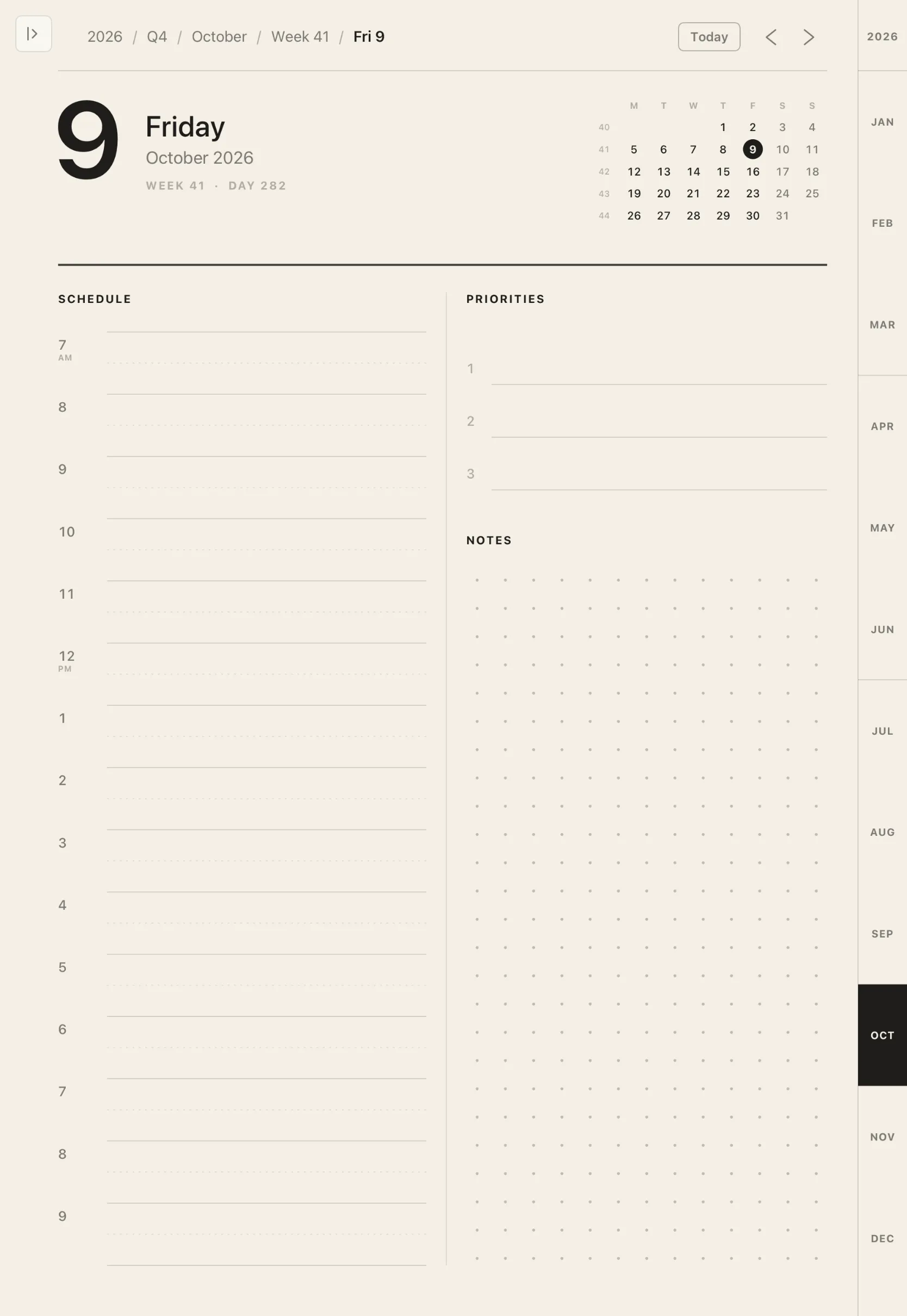 A day page from the planner, with week and month pages behind it.